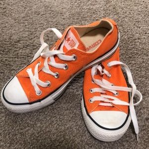 Orange converse low tops